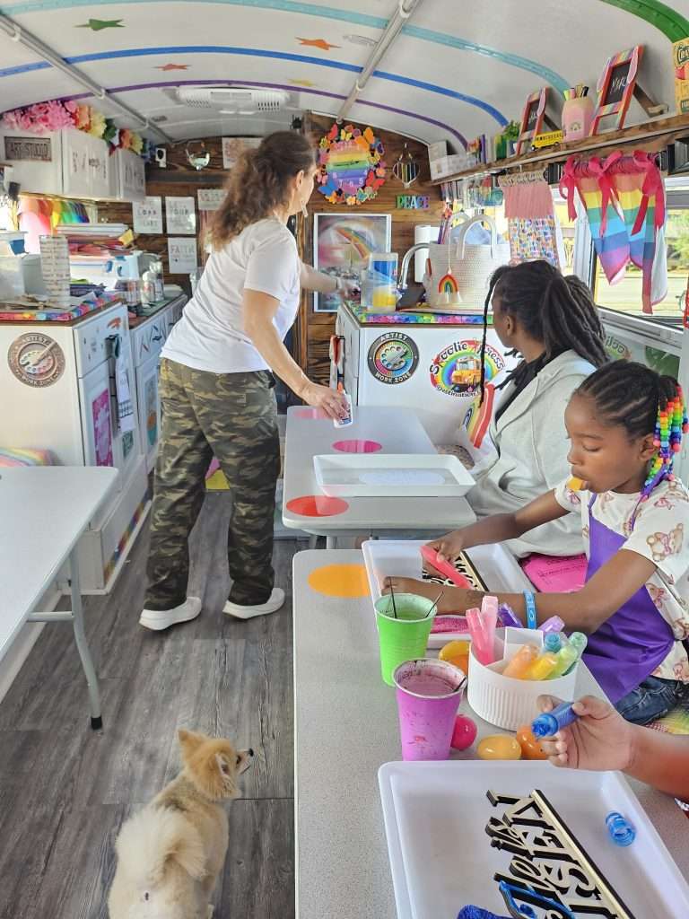 Kids enjoying a hands-on craft activity at an event